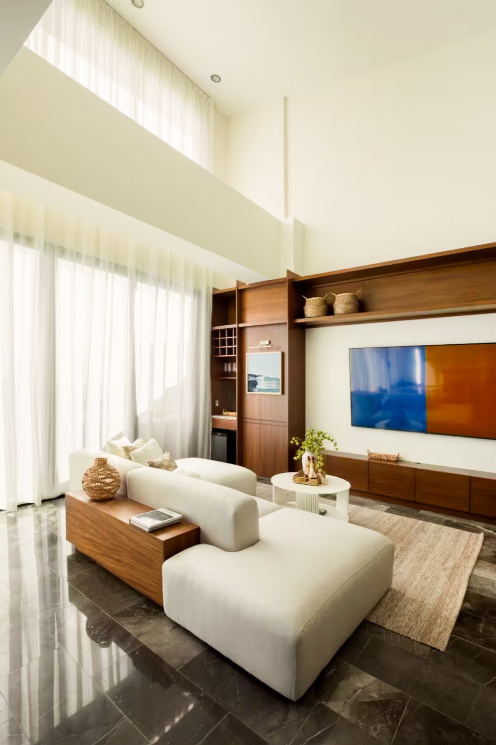 Sala de doble altura del penthouse